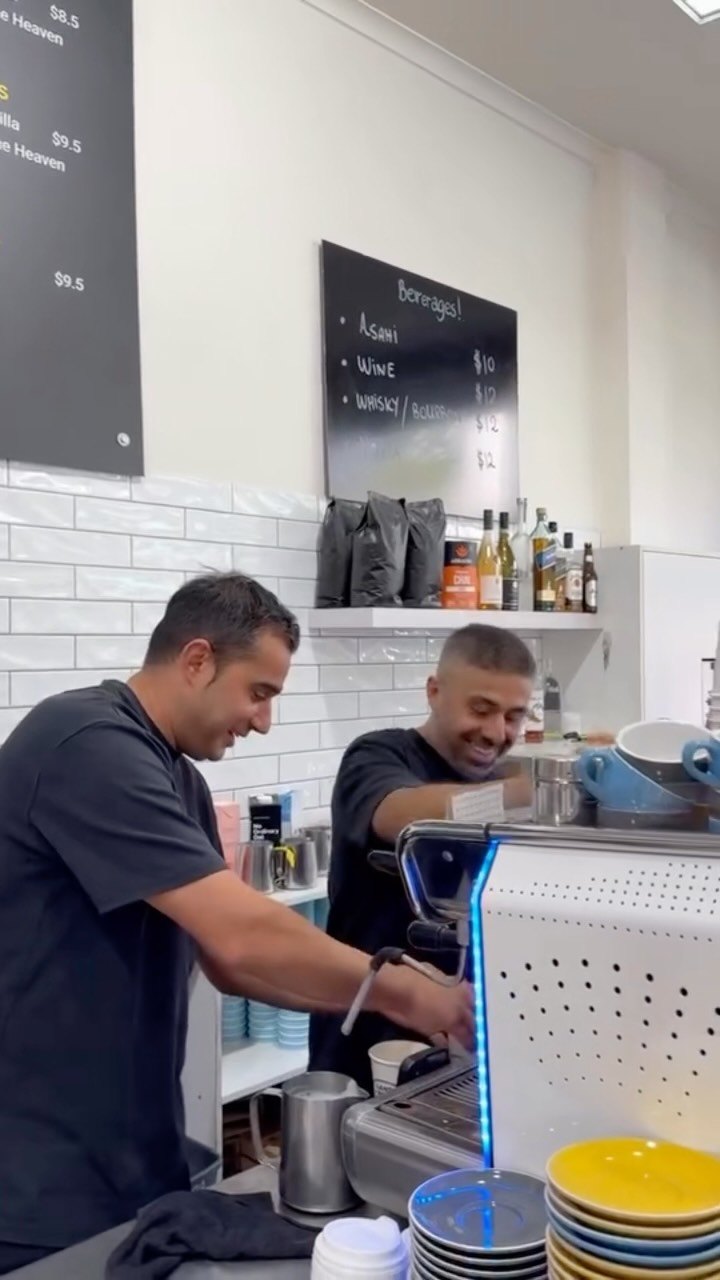 Making coffees behind the counter